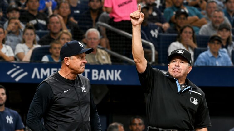 Umpire ejected Aaron Boone and bench coach Brad Ausmus following tiff over Caballero caught stealing 2B in the sixth during the Yankees' 3-0 loss to the Rays in Tampa, July 8, 2026.