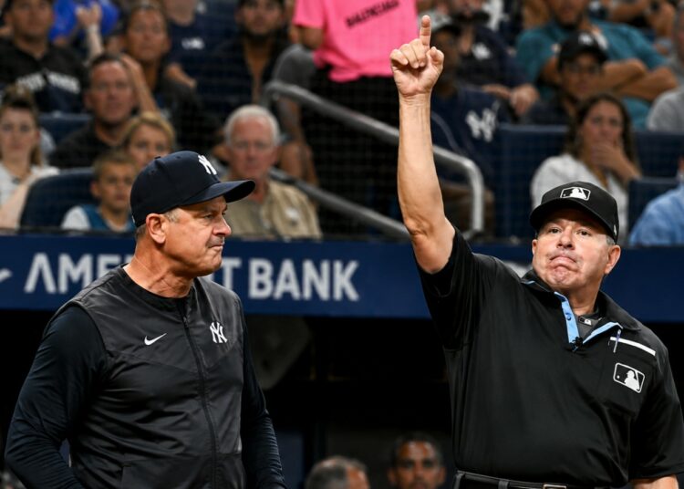 Umpire ejected Aaron Boone and bench coach Brad Ausmus following tiff over Caballero caught stealing 2B in the sixth during the Yankees' 3-0 loss to the Rays in Tampa, July 8, 2026.