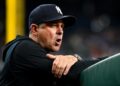 Manager Aaron Boone reacts to a defensive error during the Yankees' 9-3 loss to the Tigers in New York, Jun 30, 2026.