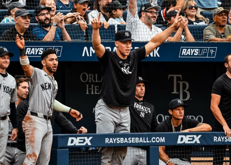 Aaron Judge and teammates celebrate Ben Rice's second home run during the Yankees' 12-4 win over the Rays in Florida, July 9, 2026.