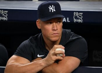 Aaron Judge watches from the dugout during the Yankees' 8-5 win over the Pirates, New York, July 20, 2026.