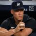 Aaron Judge watches from the dugout during the Yankees' 8-5 win over the Pirates, New York, July 20, 2026.