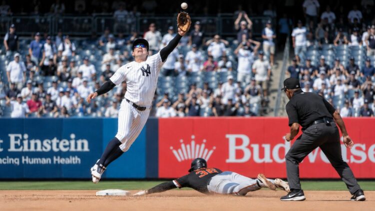 Anthony Volpe jumped as the throw went over him in 11th inning in the Yankees' 6-2 loss to the Tigers in New York, July 1, 2026.