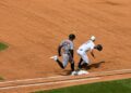 A throw from Jazz Chisholm went wide off Ben Rice in the Yankees' 11-4 loss to the Twins in New York, July 4, 2026.