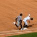 A throw from Jazz Chisholm went wide off Ben Rice in the Yankees' 11-4 loss to the Twins in New York, July 4, 2026.