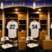 An image of the Yankees' clubhouse at New York's Yankee Stadium with Judge, Fried, Rodon, and Stanton jerseys, 2026.
