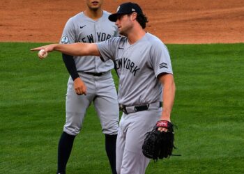 Gerrit Cole is jokingly gags Austin Wells after a circus catch in the Yankees' 3-2 win over the White Sox, Chicago, July 28, 2026.