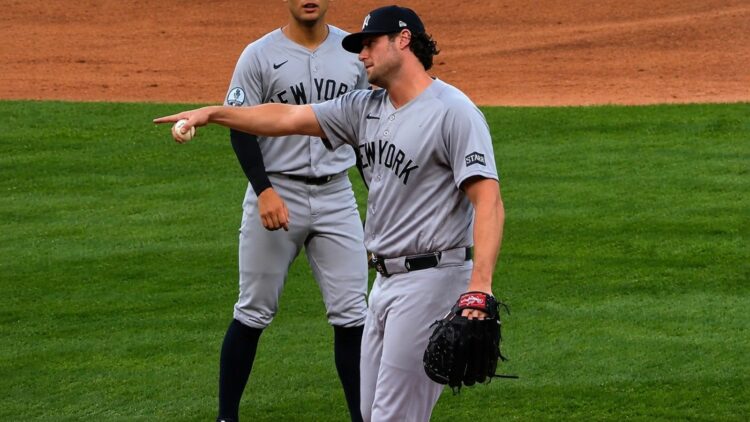Gerrit Cole is jokingly gags Austin Wells after a circus catch in the Yankees' 3-2 win over the White Sox, Chicago, July 28, 2026.