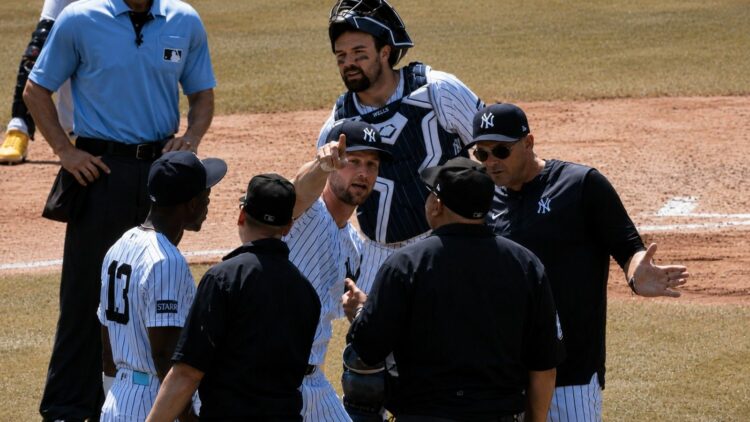 Ace pitcher Gerrit Cole argues with umpire after he was given a balk call