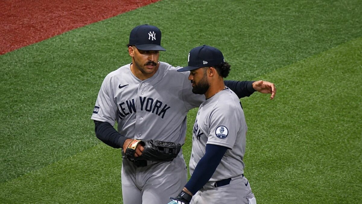 Trent Grisham talks to Jasson Dominguez after both avoided near collision in the Yankees' 6-4 loss to the Rays in Tampa, July 7, 2026.