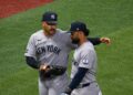 Trent Grisham talks to Jasson Dominguez after both avoided near collision in the Yankees' 6-4 loss to the Rays in Tampa, July 7, 2026.