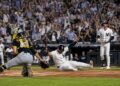 Jasson Dominguez scores a run in the Yankees' 2-0 win over the Pirates, New York, July 22, 2026.