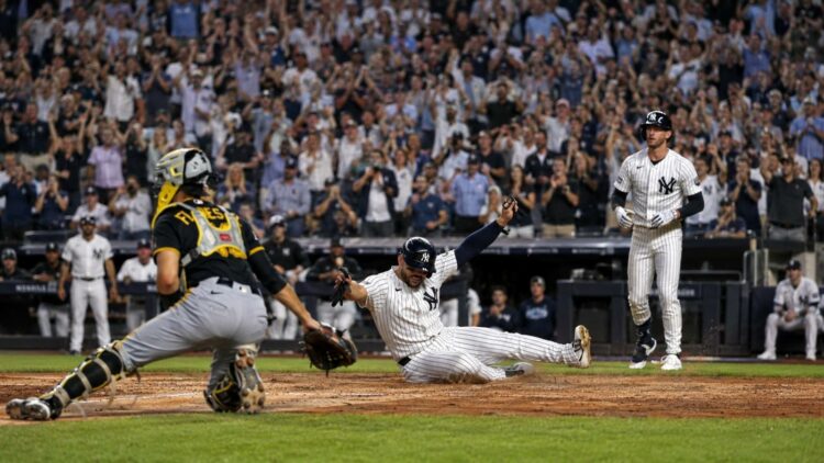 Jasson Dominguez scores a run in the Yankees' 2-0 win over the Pirates, New York, July 22, 2026.