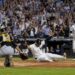 Jasson Dominguez scores a run in the Yankees' 2-0 win over the Pirates, New York, July 22, 2026.