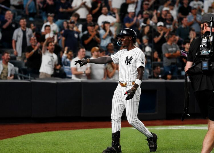 Jazz Chisholm Jr. reacts after his homer helped the Yankees beat the Dodgers 2-1 in New York, July 19, 2026.