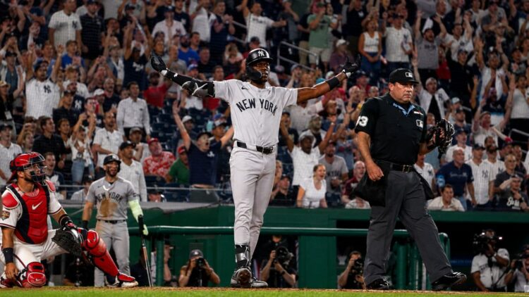 Jazz Chisholm Jr. celebrates at plate after hitting the go-ahead home run in the 9th in the Yankees' 5-3 win over the Nationals in Washington, D.C., July 10, 2026.