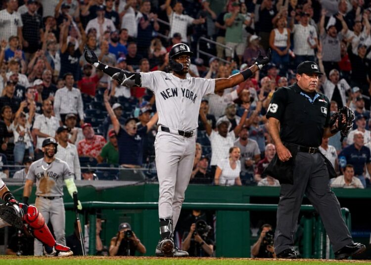 Jazz Chisholm Jr. celebrates at plate after hitting the go-ahead home run in the 9th in the Yankees' 5-3 win over the Nationals in Washington, D.C., July 10, 2026.