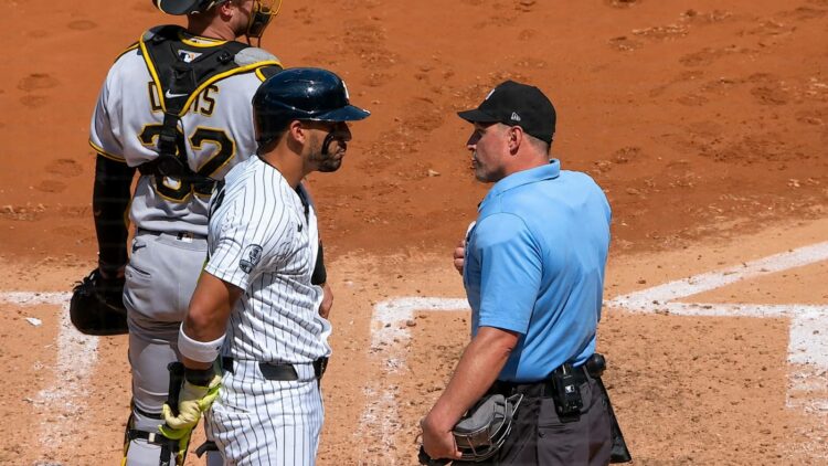 Jose Caballero argues with umpire after he was give automatic strikeout for pitch-clock violation in the Yankees' 5-3 loss to the Pirates, New York, July 22, 2026.