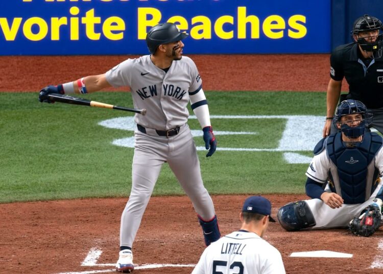 Jose Caballero flips the bat after hitting his second homer in the Yankees' 5-1 win over the Rays in Tampa, July 6, 2026.