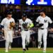 Ryan McMahon, Jose Caballero, and Cody Bellinger celebrate after the Yankees' 5-2 win over the Twins in New York, July 3, 2026.