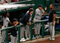 Ryan McMahon and the dugout react to Austin Wells' homer in the 9th in the Yankees' 5-3 win over the Nationals in Washington, D.C., July 10, 2026.