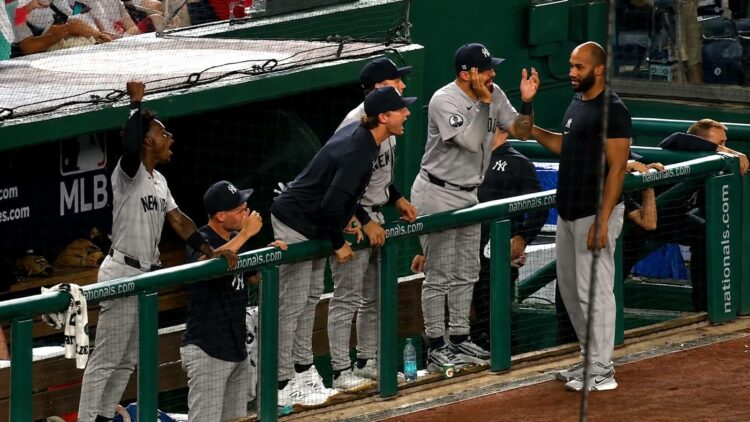 Ryan McMahon and the dugout react to Austin Wells' homer in the 9th in the Yankees' 5-3 win over the Nationals in Washington, D.C., July 10, 2026.