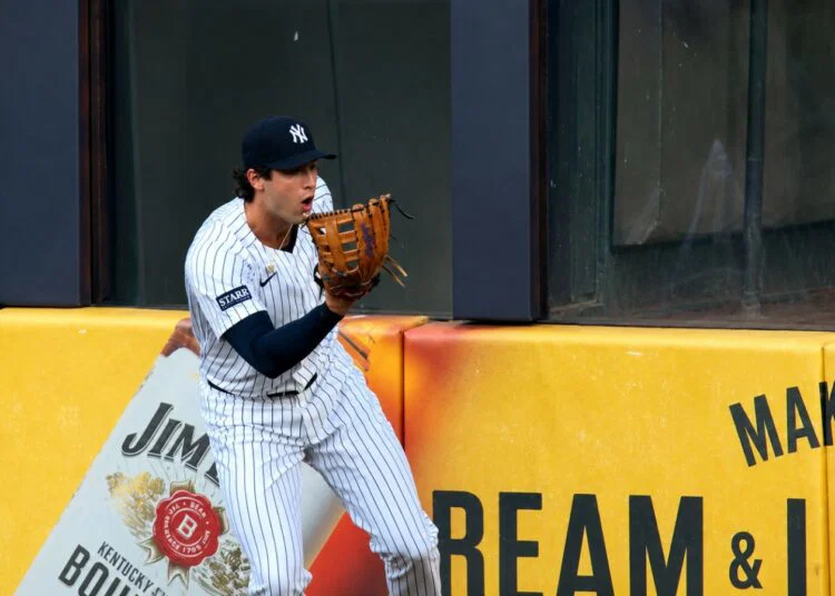 Spencer Jones in disbelief after he failed to catch a home run over the wall in the Yankees' 9-3 loss to the Tigers in New York, Jun 30, 2026.
