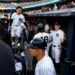 Trent Grisham and Ben Rice congratulate Goldschmidt after second run in the Yankees' 8-2 loss to the Dodgers in New York, July 19, 2026.