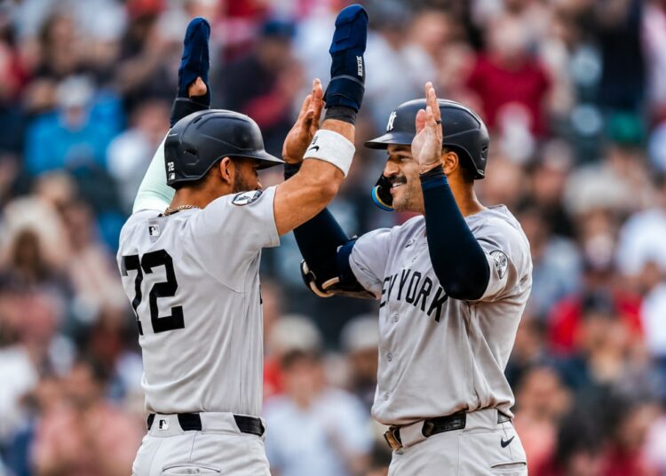 Trent Grisham celebrates with Jose Caballero after his 8th-inning go-ahead homer in the Yankees' 4-2 win over the Nationals in Washington, D.C., July 11, 2026.