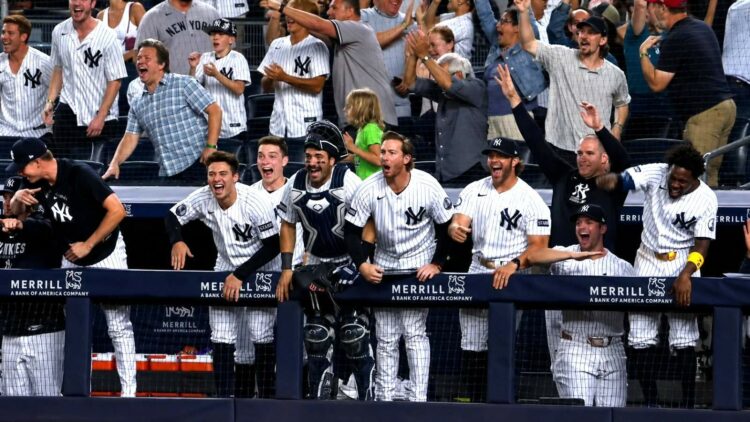 The Yankees dugout reacts to Luis Garcia Jr.'s debut homer in 13-7 loss to the Mariners, New Yor, August 3, 2026.