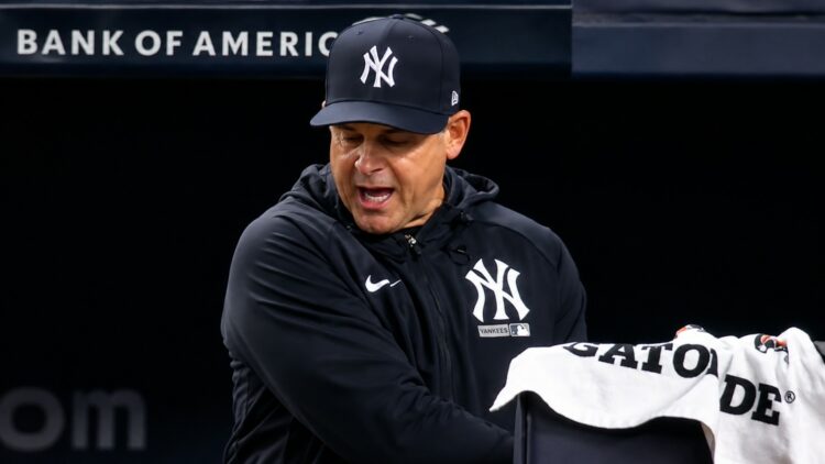 Aaron Boone reacts to Grisham's 2B tagging in the Yankees' 1-0 loss to the Mariners, New York, August 13, 2026.