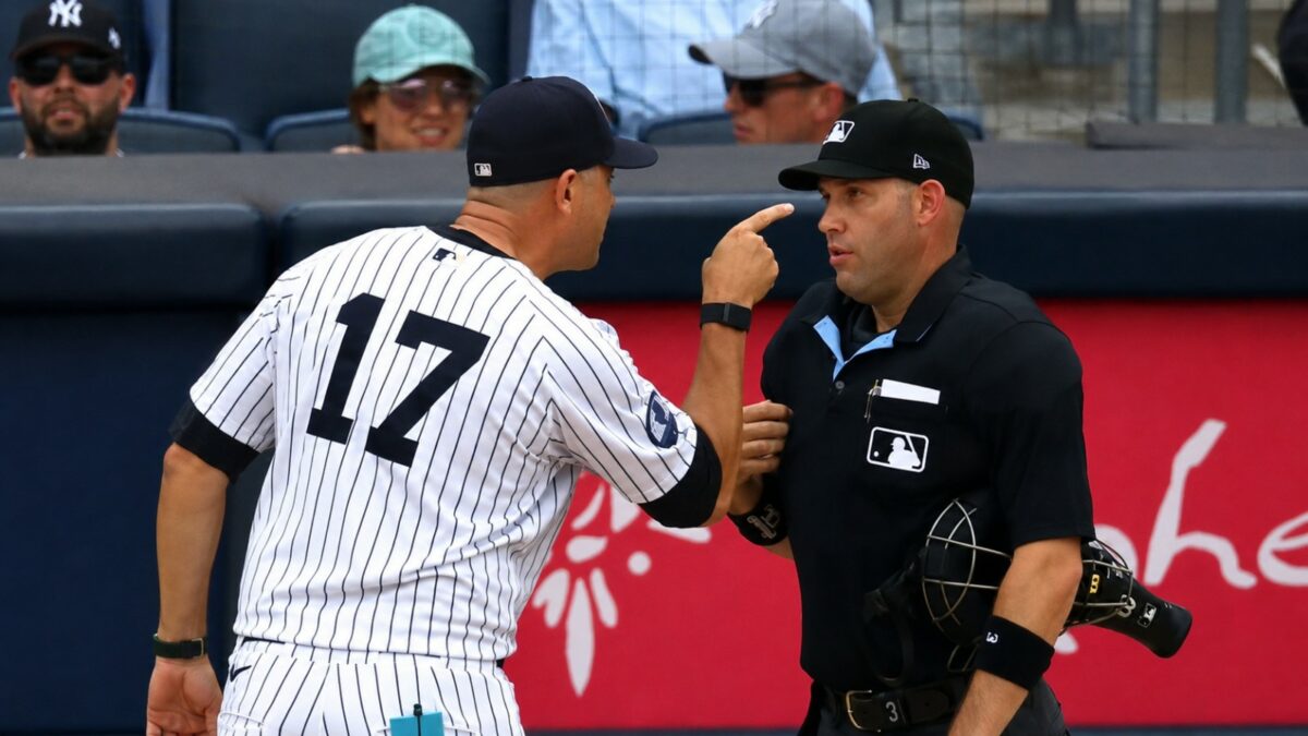 Manager Aaron Boone argues with umpire during the Yankees' 5-4 win over the Braves, New York, August 8, 2026.