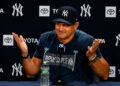 Aaron Boone replies like a shrug emoji to a question on the bullpen load prior to the Yankees' 9-2 win over the Red Sox, New York, August 29, 2026.