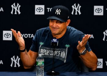 Aaron Boone replies like a shrug emoji to a question on the bullpen load prior to the Yankees' 9-2 win over the Red Sox, New York, August 29, 2026.