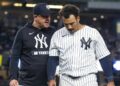 Yankees manager Aaron Boone and Trent Grisham in July 2026.