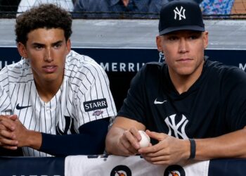 George Lombard Jr. and Aaron Judge are in the dugout during the Yankees' 2-0 win over the Cardinals, New York, August 4, 2026.