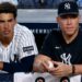 George Lombard Jr. and Aaron Judge are in the dugout during the Yankees' 2-0 win over the Cardinals, New York, August 4, 2026.