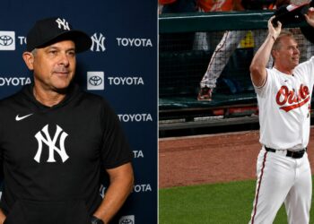 Manager Aaron Boone reacts to Pete Alonso's disputed homer call after the Yankees' 5-3 win over the Orioles, Baltimore, August 19, 2026.
