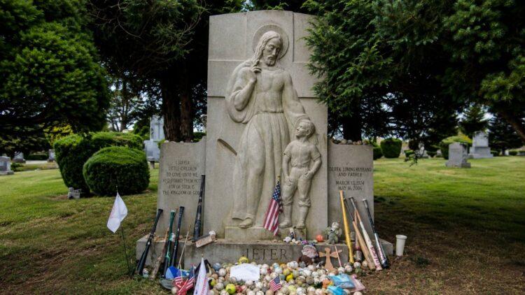 Babe Ruth's grave is next to his wife Claire and 100 feet from where Billy Martin was buried at Gate of Heaven Cemetery in Hawthorne, New York.