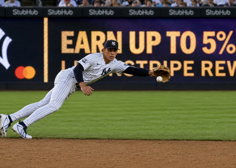 George Lombard Jr. made a diving defense that ended in a double play in the Yankees' 3-1 loss to the Cardinals, New York, August 5, 2026.