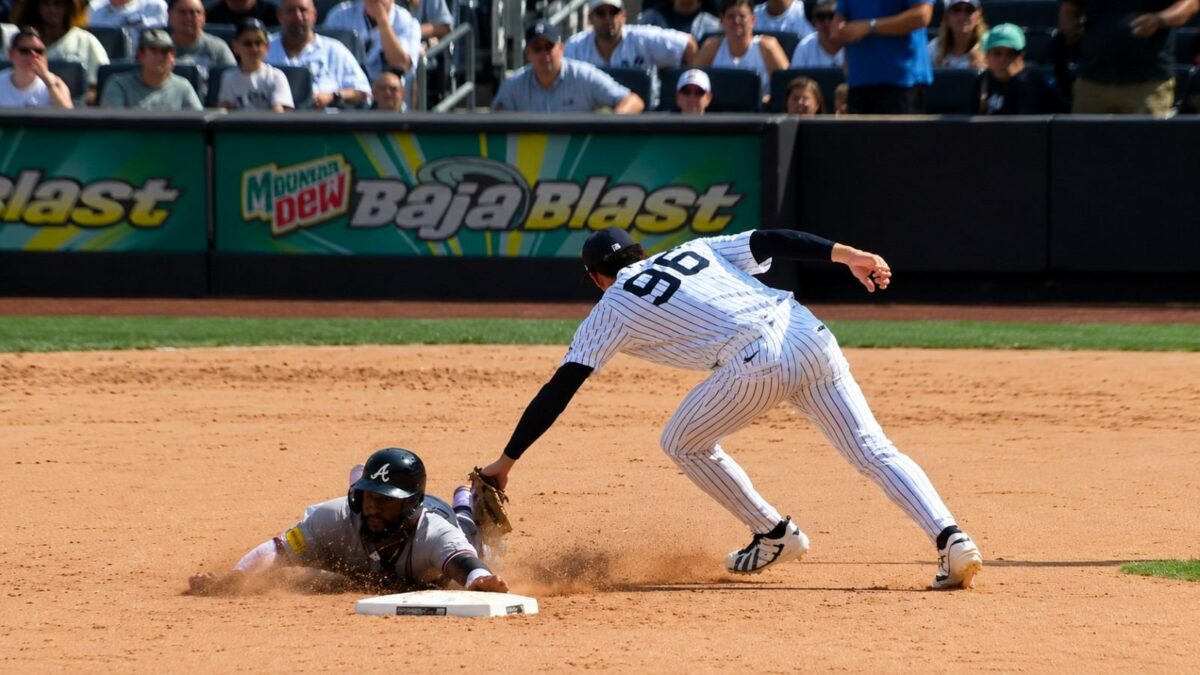 George Lombard Jr. tags Braves' Michael Harris II at 2B in the Yankees' 2-1 loss to the Braves, New York, August 9, 2026.