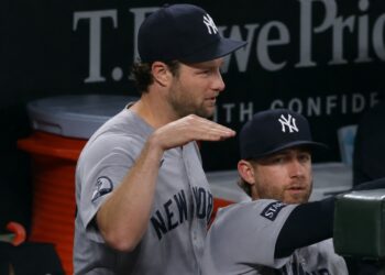 Gerrit Cole is in the dugout during the Yankees' 6-1 win over the Orioles, Baltimore, August 20, 2026.