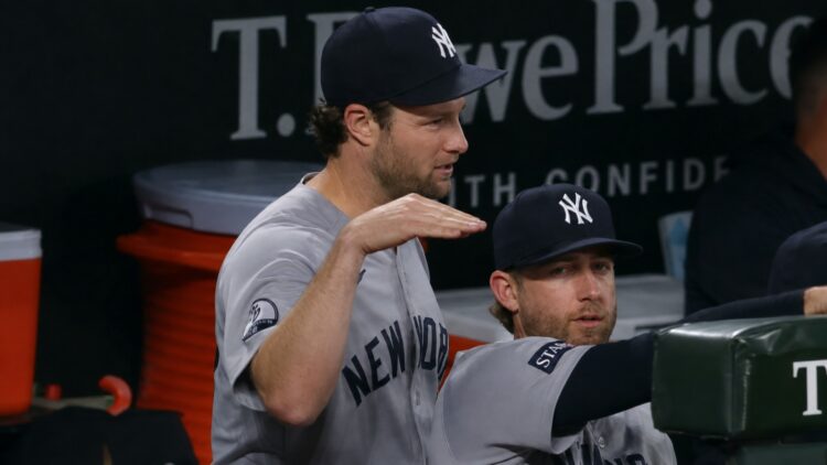 Gerrit Cole is in the dugout during the Yankees' 6-1 win over the Orioles, Baltimore, August 20, 2026.