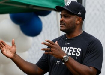 New York Yankees' hitting coach James Rowson is speaking at a team meet in Tampa, 2026.