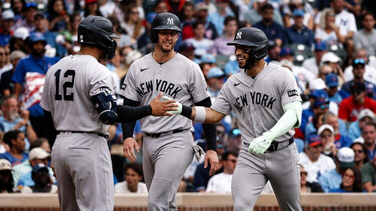Jose Caballero was with Ryan McMahon and Trent Grisham after hitting a two-run homer in the Yankees' 2-1 win over the Cubs at Wrigley Field, Chicago, August 2, 2026.