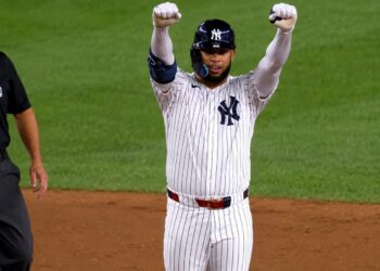 Luis Garcia Jr. signals after reaching the second base in the Yankees' 4-1 win over the Mariners, New York, August 11, 2026.