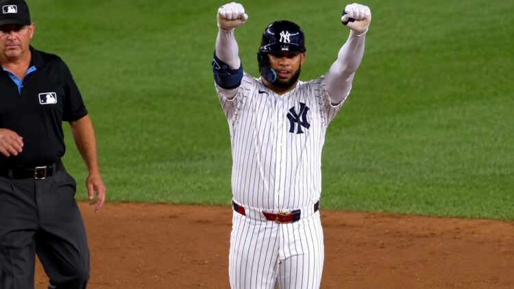 Luis Garcia Jr. signals after reaching the second base in the Yankees' 4-1 win over the Mariners, New York, August 11, 2026.