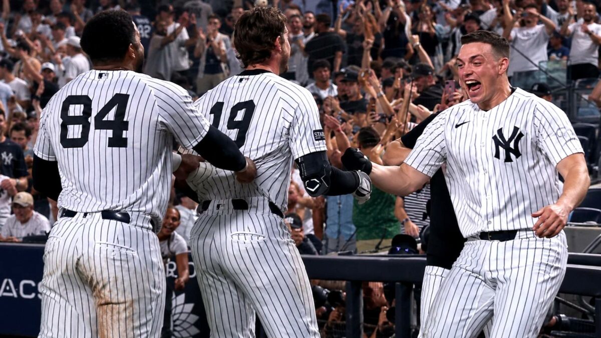 Ryan McMahon, Heliot Ramos and Ben Rice celebrate after the Yankees' 3-2 walk-off win over the Braves, New York, August 7, 2026.