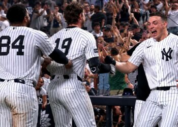 Ryan McMahon, Heliot Ramos and Ben Rice celebrate after the Yankees' 3-2 walk-off win over the Braves, New York, August 7, 2026.
