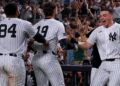 Ryan McMahon, Heliot Ramos and Ben Rice celebrate after the Yankees' 3-2 walk-off win over the Braves, New York, August 7, 2026.
